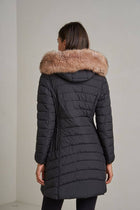 Long quilted down jacket with fur on hood: Beige