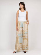 Flowing satin trousers -Equestrian bits pattern