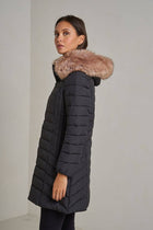 Long quilted down jacket with fur on hood: Beige