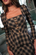 Yina- Top made in camel and navy blue checkered fabric.